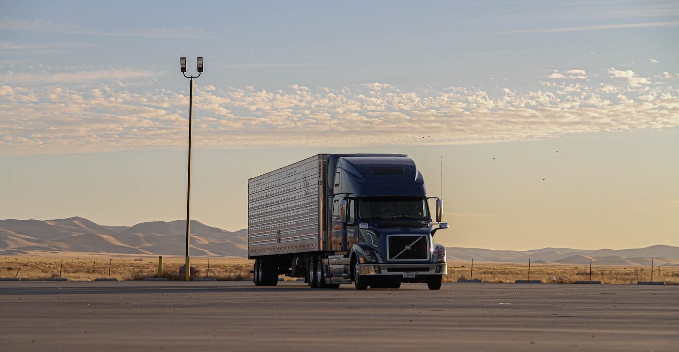 RAASO Trucking Volvo VNL with dry van at a truck stop